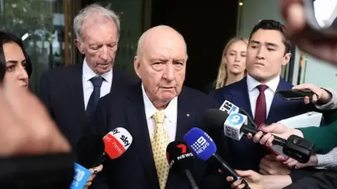 Sexual Assault Accusations Involving Prominent Australian Media Personality Downgraded